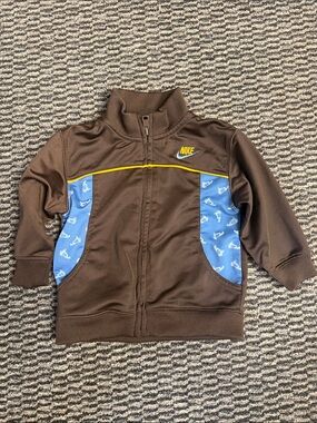 Nike Brown Kids Zip-Up Jacket with Blue Panels and Yellow Accents